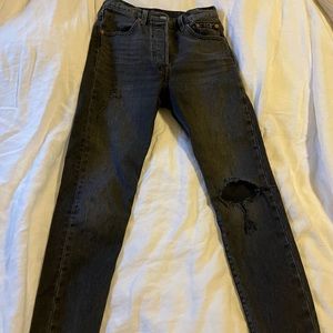Wash’s black Levi 501s
